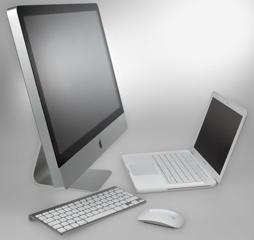 Nowy iMac w towarzystwie klawiatury i myszki oraz białego MacBooka 13,3