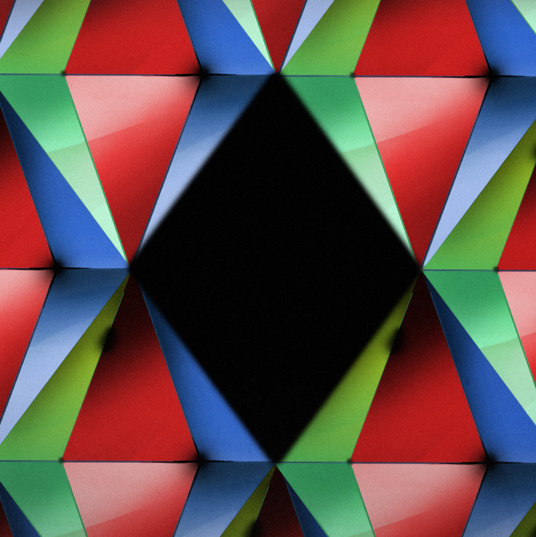 Mozaika z czerwonych, zielonych i niebieskich trójkątów.