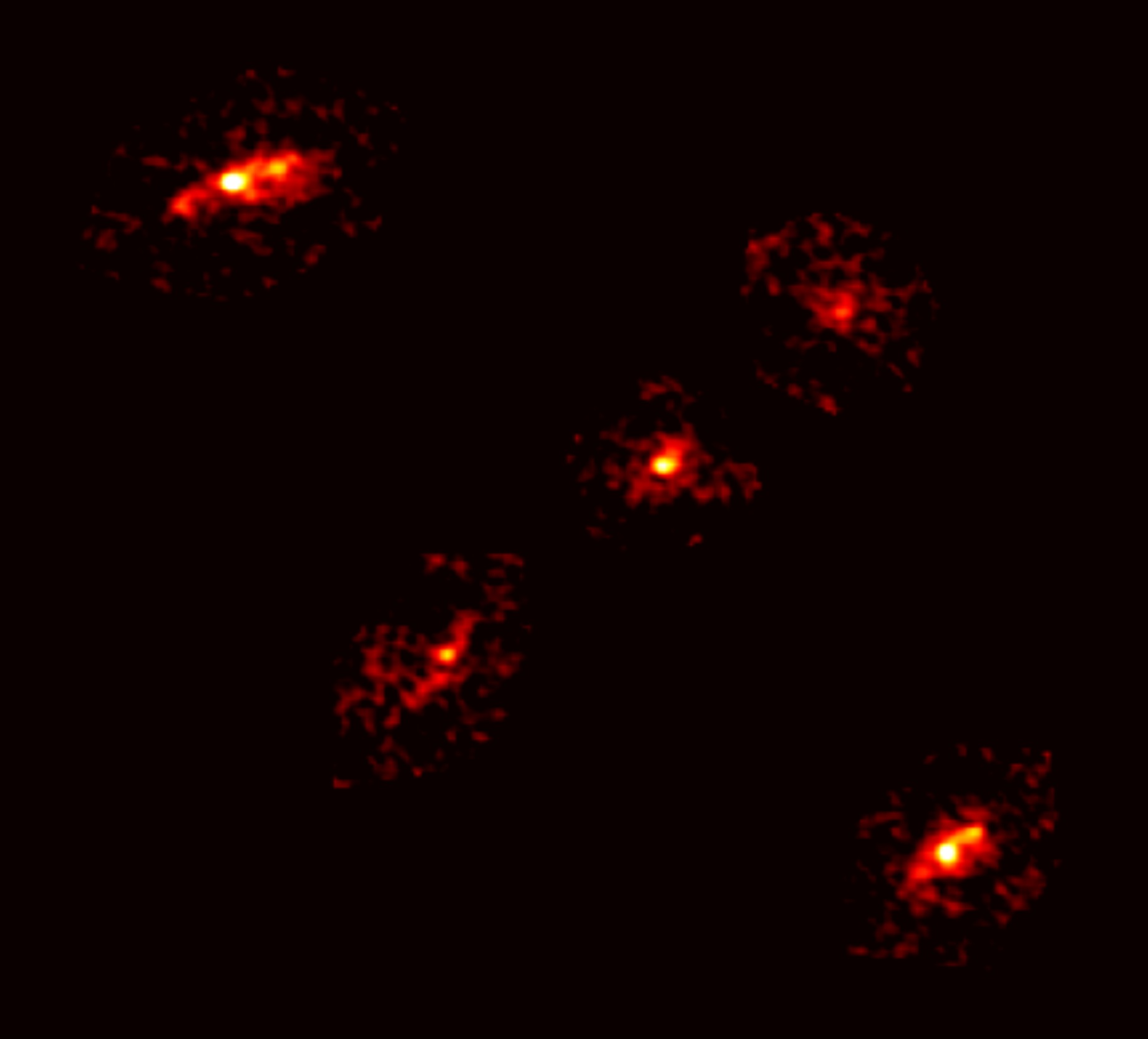 Astronomowie odkryli niezwykły Krzyż Einsteina. Pięć obrazów zdradza sekrety ciemnej materii
