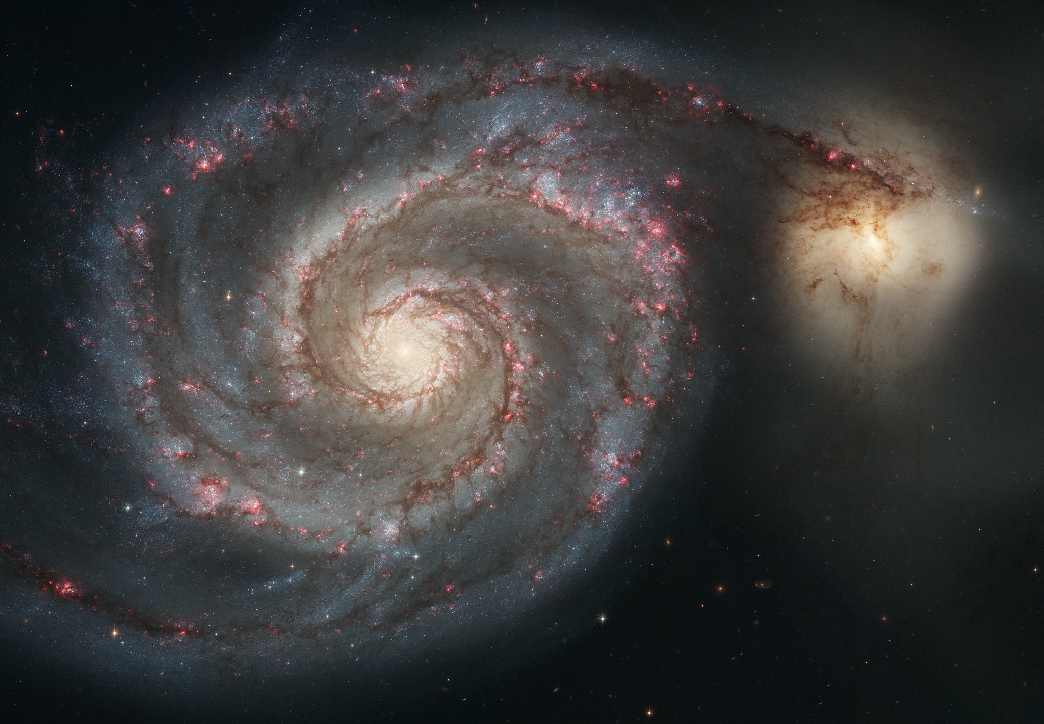 Dwa tajemnicze obiekty w pobliżu słynnej galaktyki. Astronomowie pytają, gdzie zniknęły tamtejsze gwiazdy